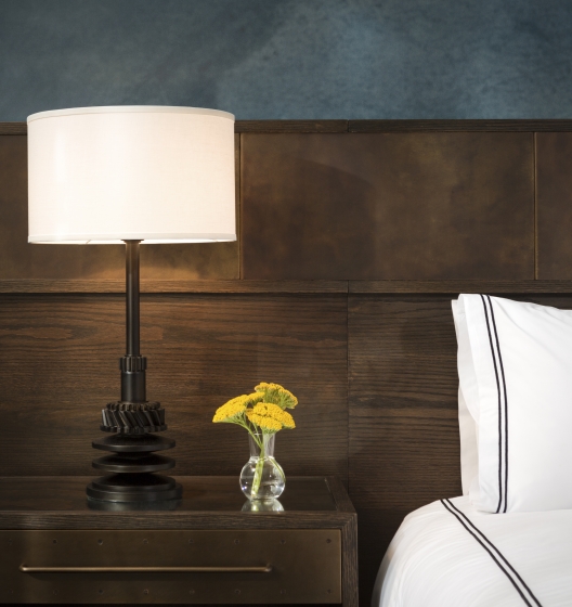hotel bed and side table