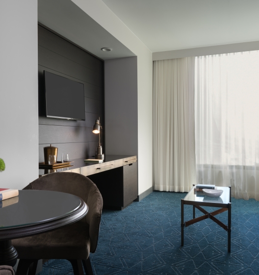Spa Suite with couch, coffee table and tv