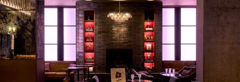 Art nouveau-inspired Brass Poppy cocktail lounge in the Hotel Van Zandt lobby