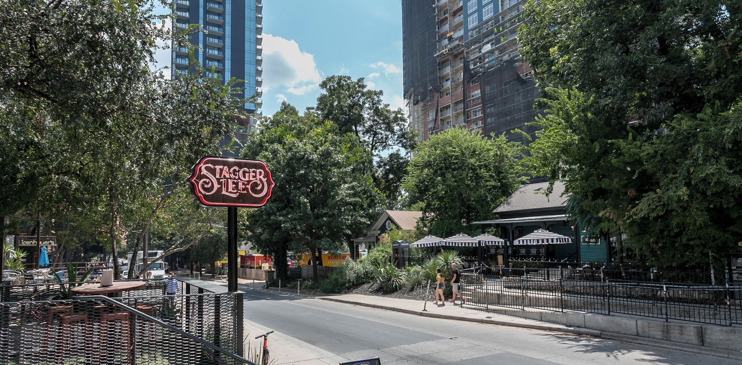 Bustling 6th Street entertainment district in downtown Austin, Texas near Hotel Van Zandt